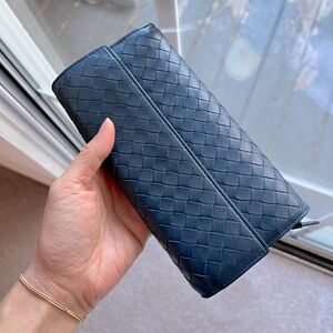 Bottega Veneta navy long flap wallet snap button closure